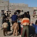 Soldiers hand out soccer balls in Tal Afar