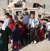 Soldiers hand out soccer balls in Tal Afar