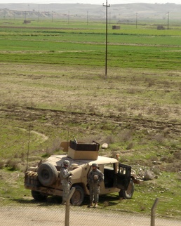 Artillery Soldiers survey new AO