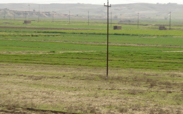 Artillery Soldiers survey new AO