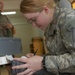 Pfc. Hunt helps a Soldier receive casual pay