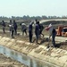 Coalition helps Iraqi citizens clean canals