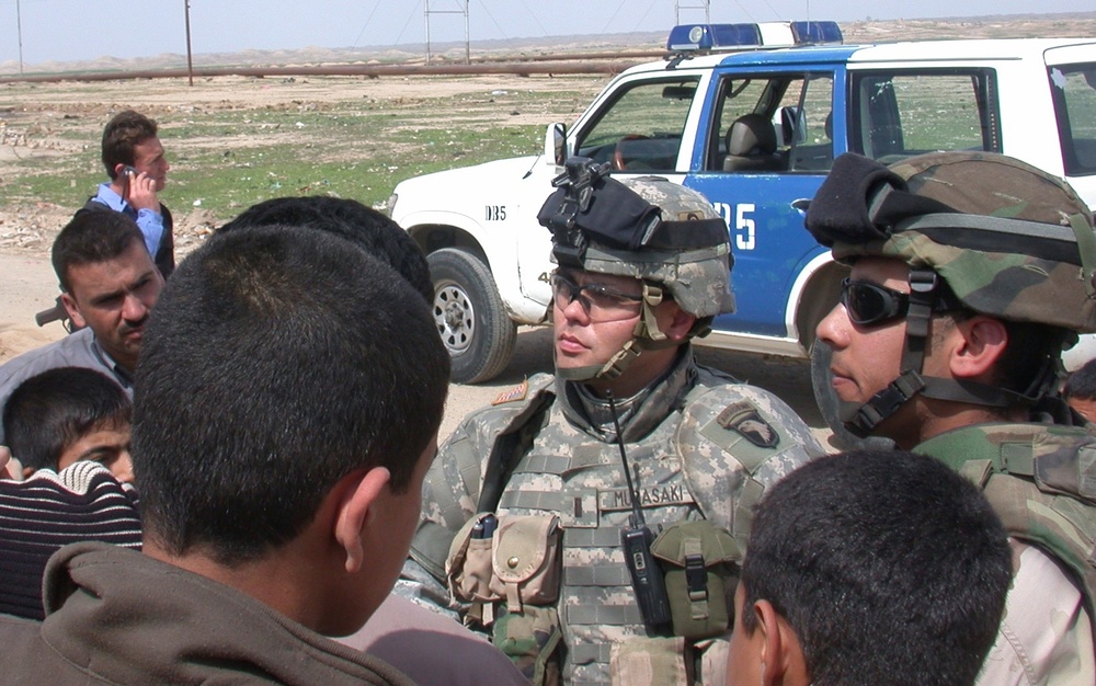 1st. Lt. Yukitoshi Murasaki inspects Iraqi Police post