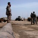 Iraqi Strategic Infrastructure Battalion Soldiers stand atop the