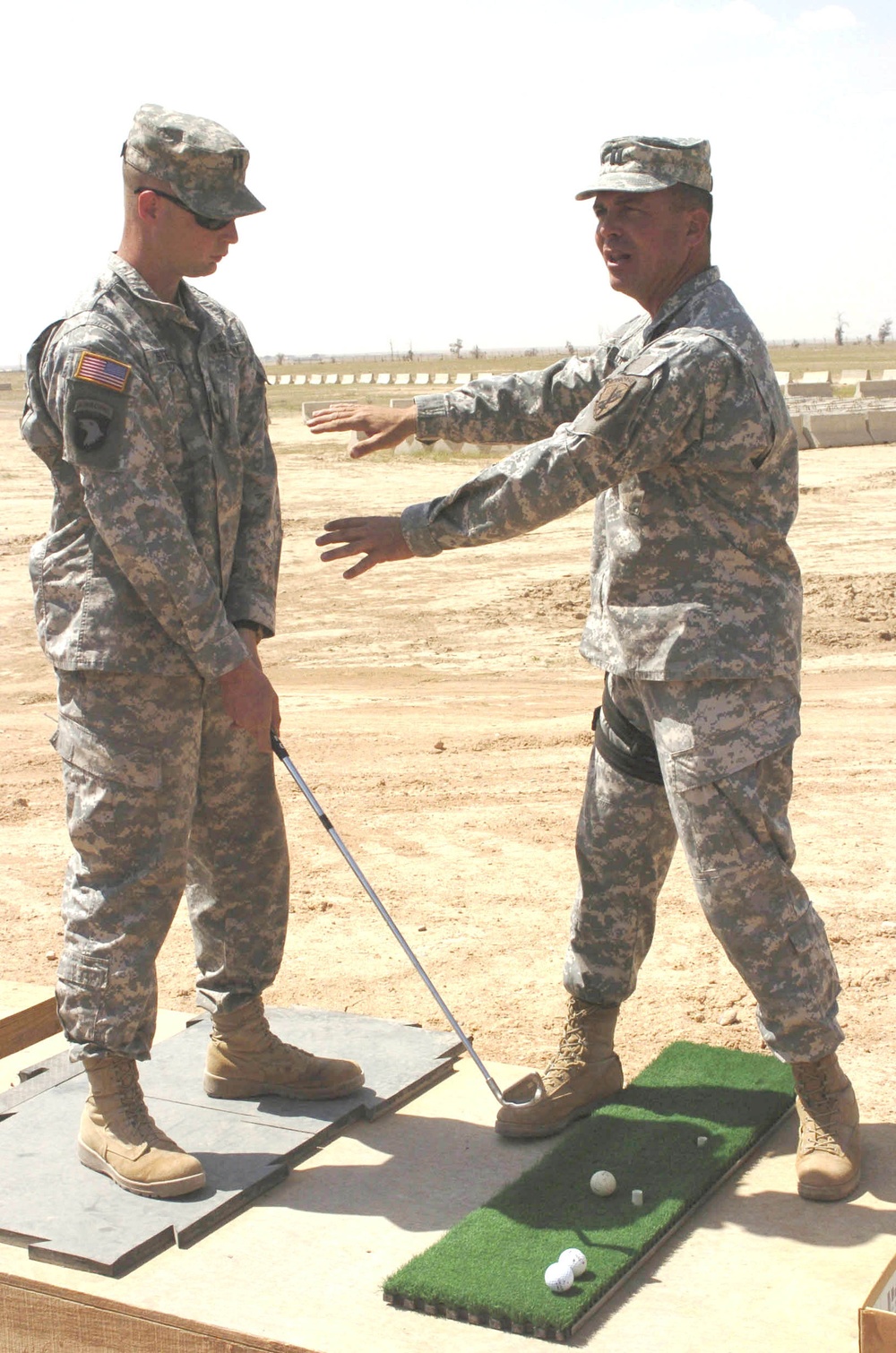 Capt. Mark Flitton Gives a Golf Lesson in Tikrit, Iraq