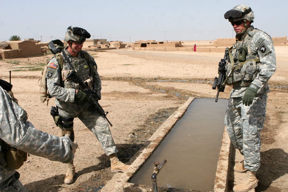 Soldiers Look at Water Supply