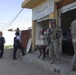 Iraqi Police in Taza visit loacal merchants