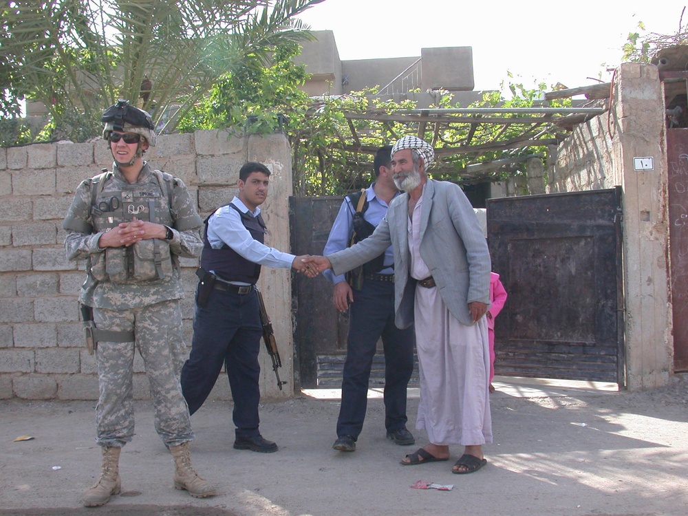 Iraqi Police in Taza and US Soldiers visit Taza neighborhood