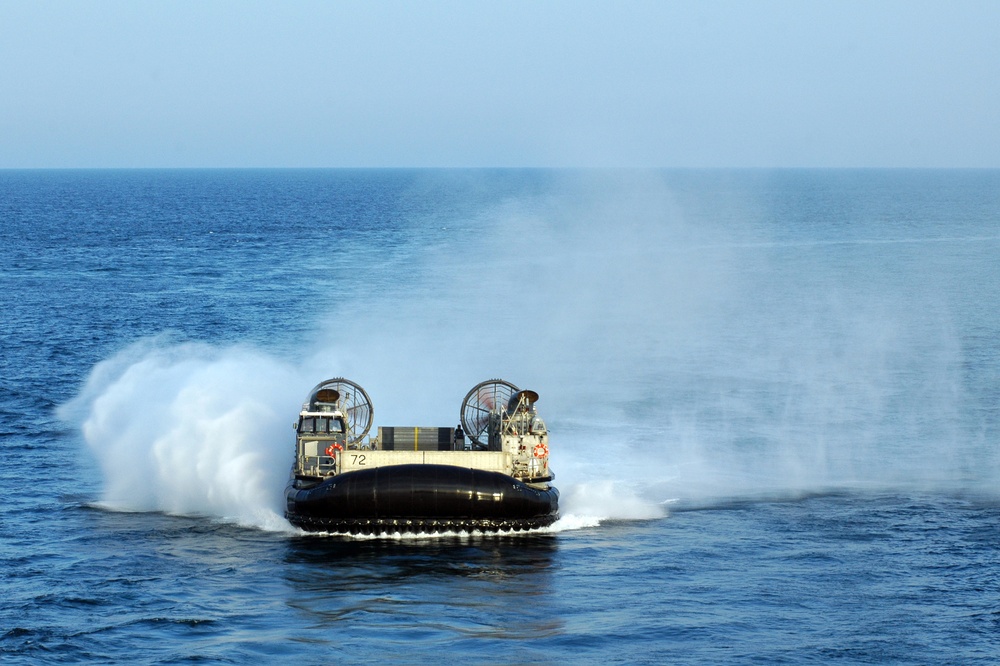 Landing Craft Air Cushion Seven Two prepares to enter the well deck of the