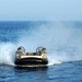 Landing Craft Air Cushion Seven Two prepares to enter the well deck of the