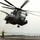 A CH-53 Super Stallion leaves the deck of USS Peleliu