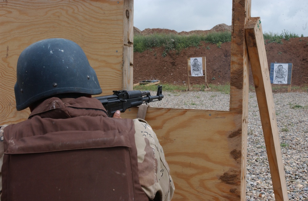 Iraqi Army Soldiers zero their weapons and shoot at different targets