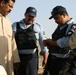 Marines and Iraqi police patrol Khandari