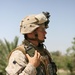 Marines and Iraqi police patrol Khandari