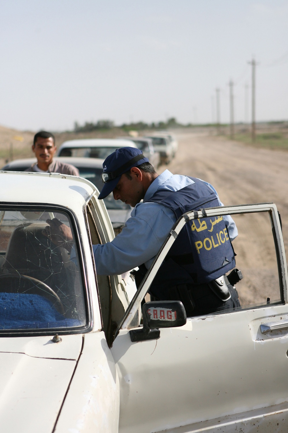 Marines and Iraqi police patrol Khandari