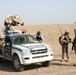 Marines and Iraqi police patrol Khandari
