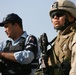Marines and Iraqi police patrol Khandari