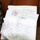 The image shows handwritten letters on lined notebook paper resting on what appears to be a brown leather surface. The letters contain quilting instructions addressed to 'Lynn &amp; Quilters,' including diagrams of a star quilt pattern with notes about fabric colors and quantities. The correspondence discusses techniques for making star-point quilts using six fabrics in reds and creams.