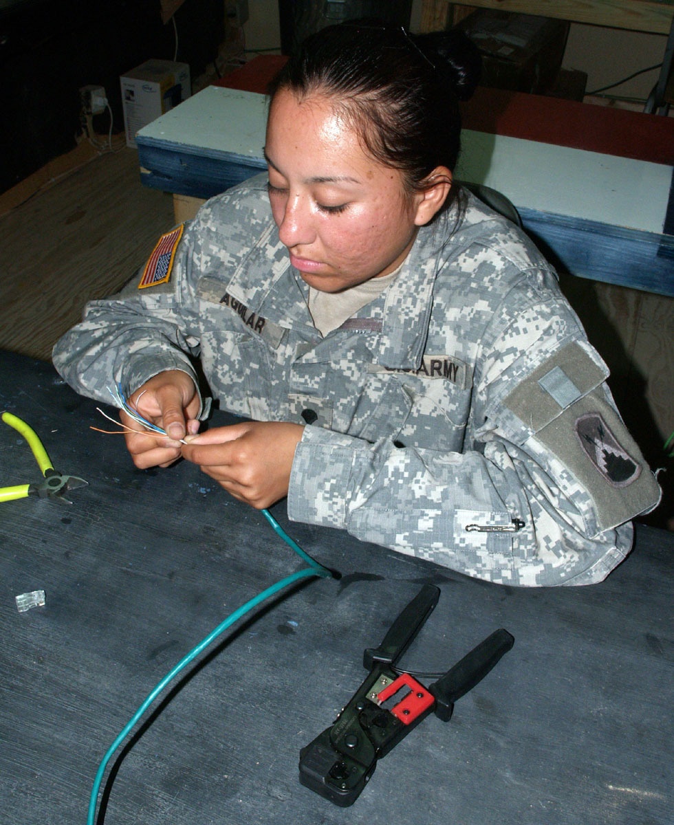 Signal Soldiers Maintain Communications Link