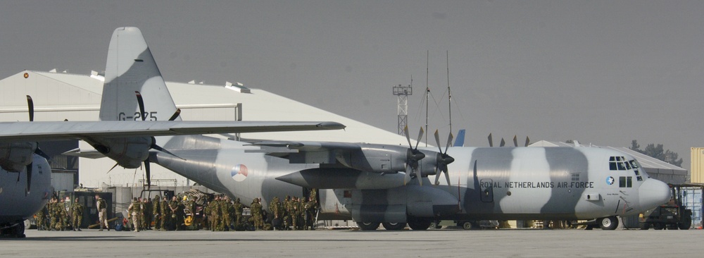 Troops Board a Royal Neatherland Air Force C-130 Hercules