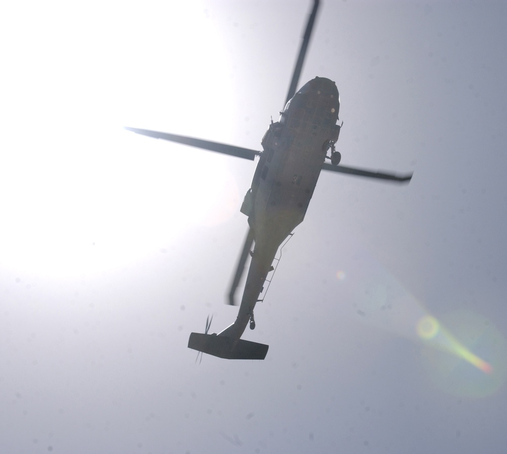 Blackhawk flies over Camp Taji, Iraq, Ammo Holding Area