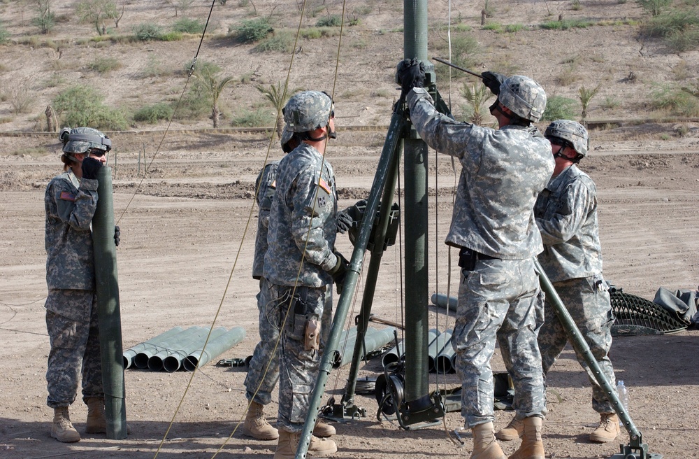 MND-B Soldiers Raise 100-foot Tower, Ensure Combat Readiness