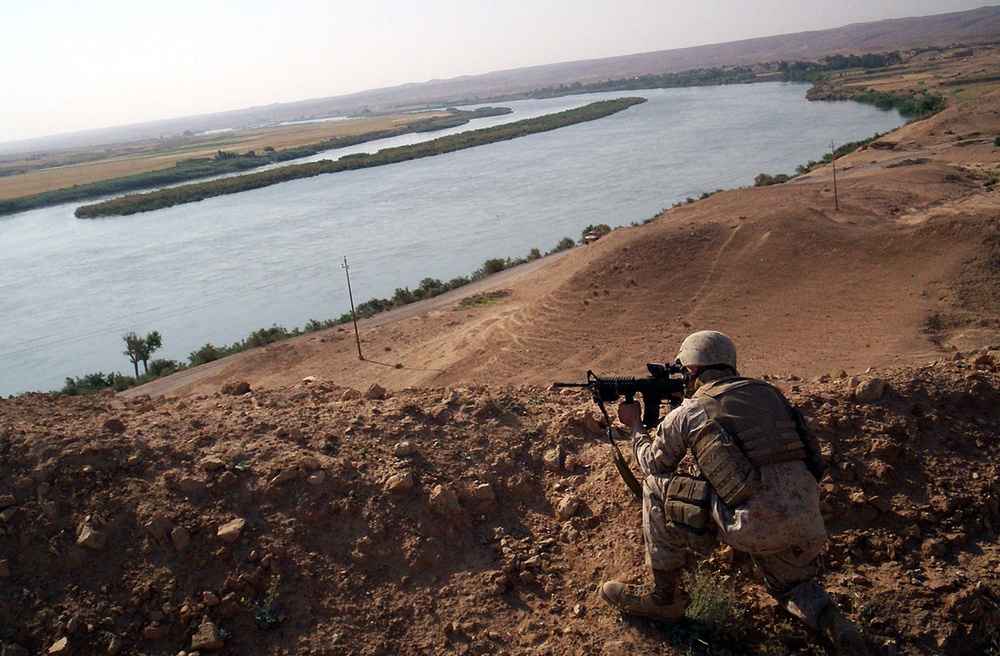 Marines battle the elements while facing insurgents and improvised explosiv
