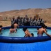 Orphans receive pool from 172nd Stryker Brigade