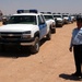 Iraqi police see new police trucks as symbols of progress