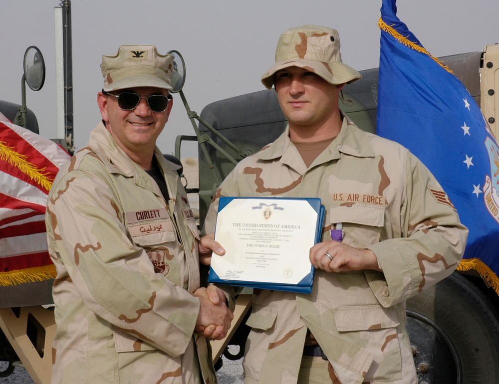 Airman presented Purple Heart for military merit