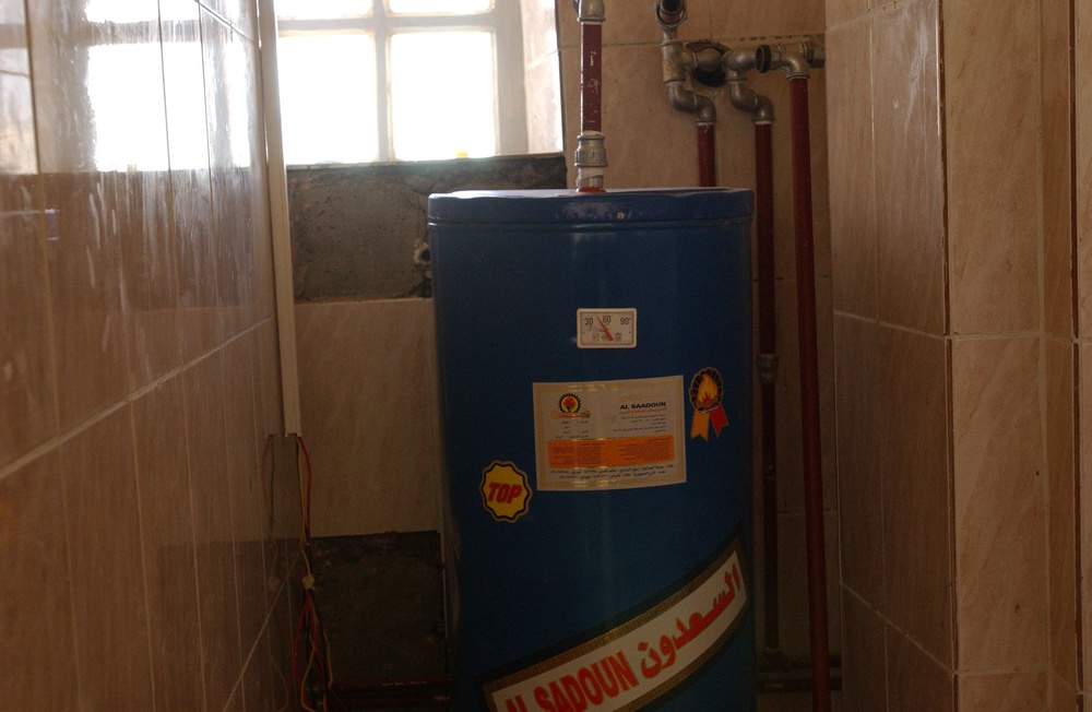 MITT team rebuilds barracks