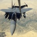 An  F-15 Strike Eagle Gets Gas From a KC-10 Extender