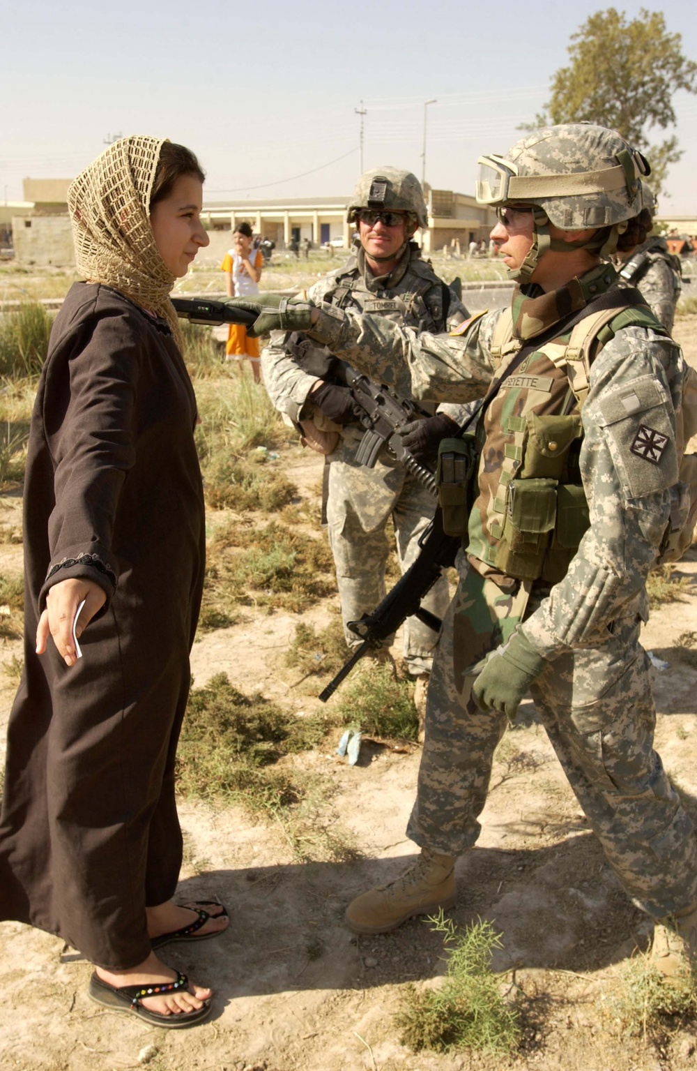 Soldier Searches Iraqi