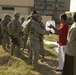 Iraqis and U.S. Troops Pass Water