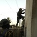 National Policeman Climbs Building