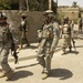 INPs and US Troops Move Through the Streets of Iraq