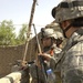 US Troops Inspect Weapon