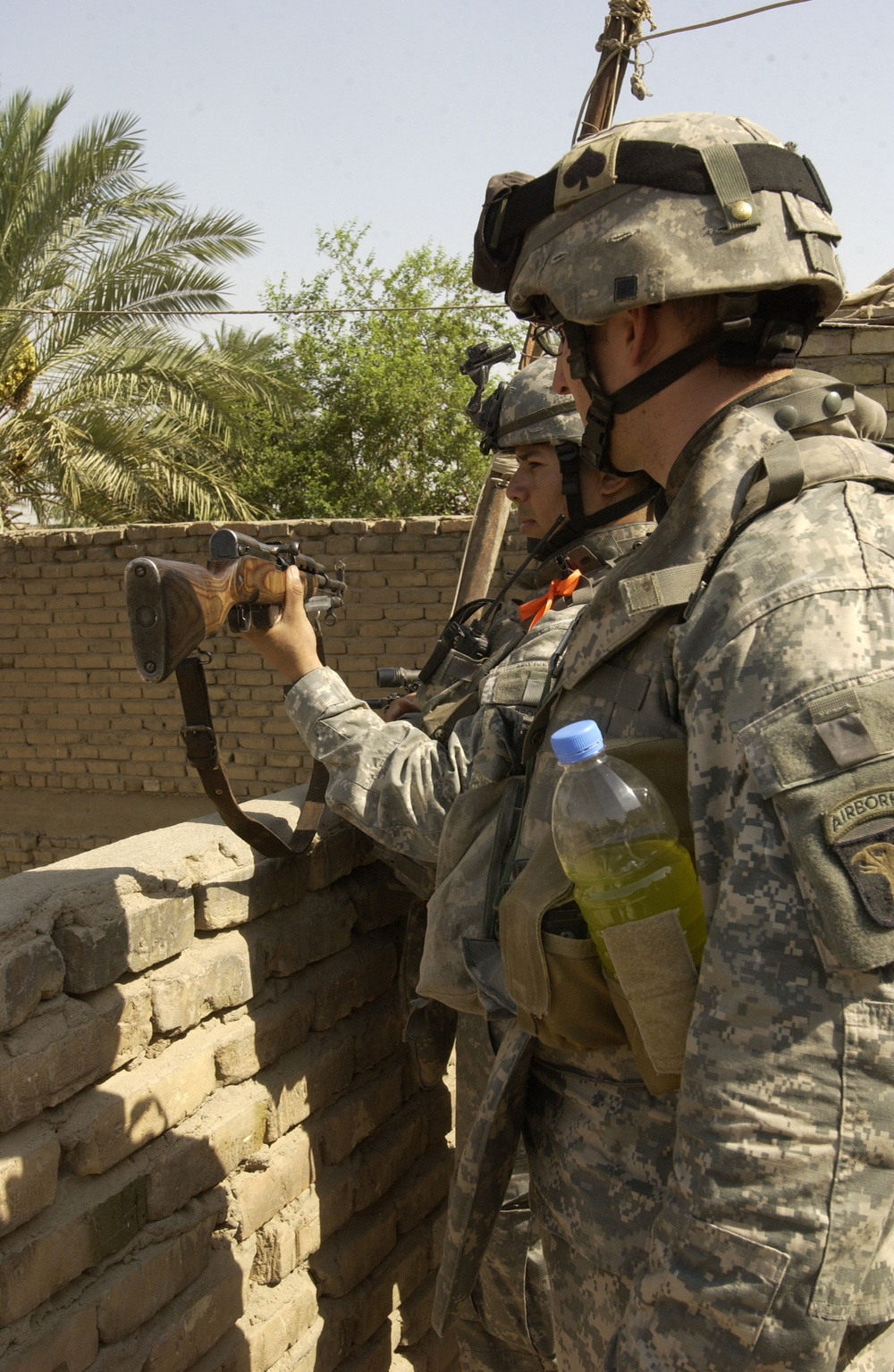 Troops Inspect Weapon