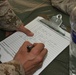 RCT-5 doctors examine deaf Fallujah girl