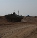 Iraqi and U.S. Forces conduct patrol together