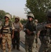 Iraqi and U.S. Forces conduct patrol together