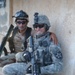 Iraqi and U.S. Forces conduct patrol together