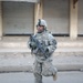 Soldiers Walk Through Al-Karama Neighborhood