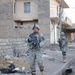 Soldiers Walk Through Al-Karama Neighborhood