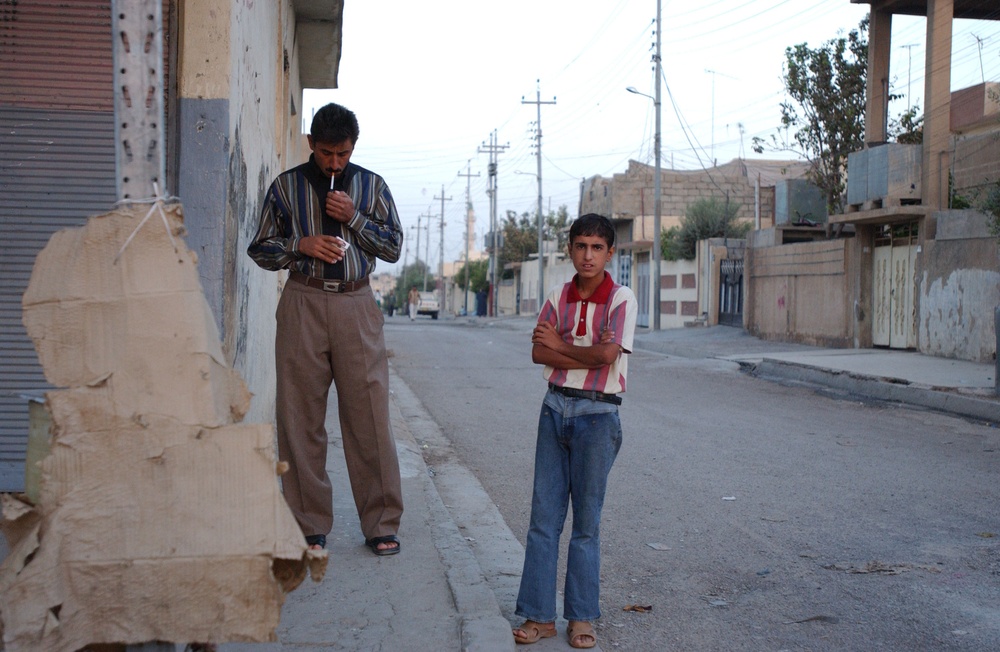 Soldiers Walk Through Al-Karama Neighborhood