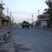 Soldiers Walk Through Al-Karama Neighborhood