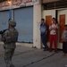 Soldiers Walk Through Al-Karama Neighborhood