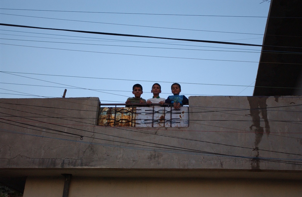 Soldiers Walk Through Al-Karama Neighborhood