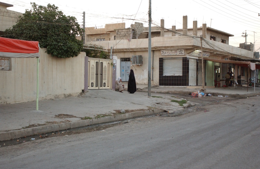 Soldiers Walk Through Al-Karama Neighborhood