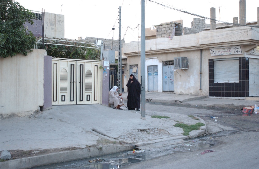 Soldiers Walk Through Al-Karama Neighborhood